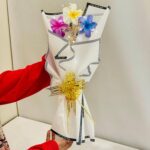 Handmade Decorative Plumeria Bouquet with Golden Ribbon - Image 5